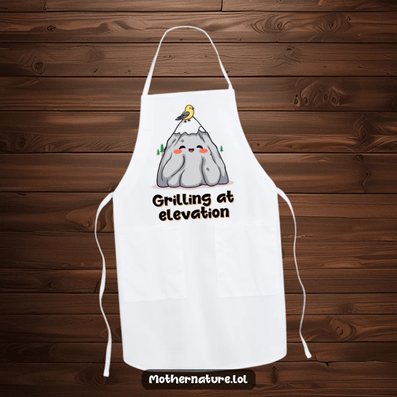 Funny apron showing a mountain character shrugging amiably, with a bird on its head, ideal for cooks.