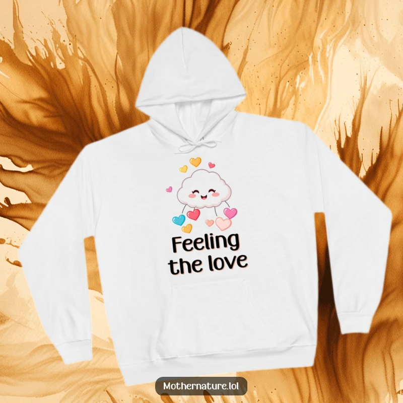 Funny hoodie depicting a small, adorable cloud character erupting in giggles as it showers the world with bright, bouncing, colorful heart-shaped raindrops.