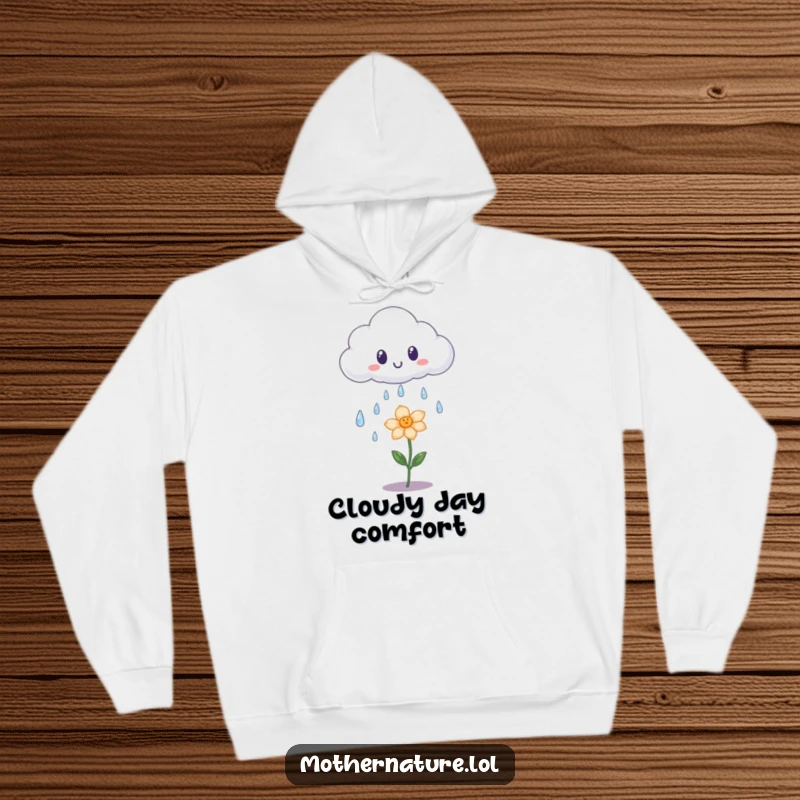Funny hoodie depicting a surprised cloud shedding iridescent raindrops onto a tiny, happy flower; cozy and magical.