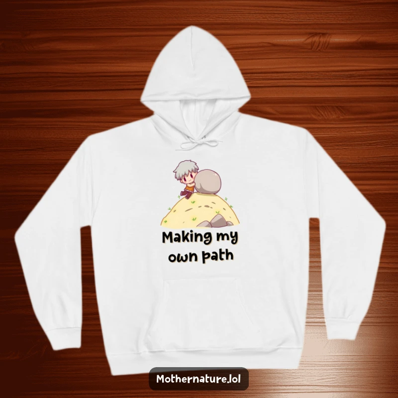 Funny hoodie featuring a character playfully pushing a large boulder down a gentle hill.
