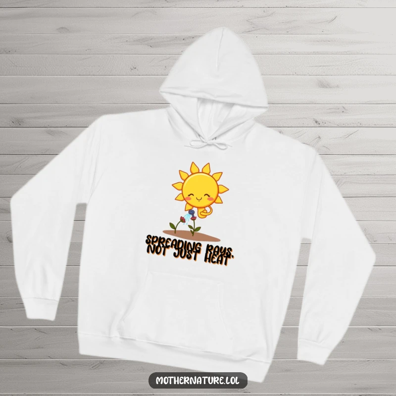 Funny hoodie depicting a smiling sun character watering a small, drooping flower, perfect for cozy, humorous days.