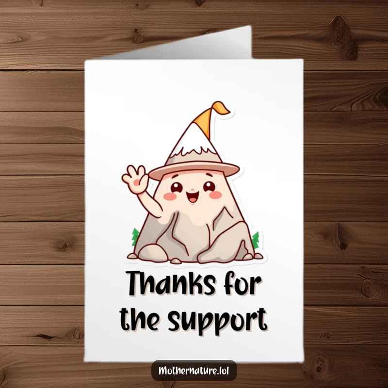 Funny Free Printable Thank You Card: A playful mountain range character wearing a silly hat waves, offering downloadable thanks.